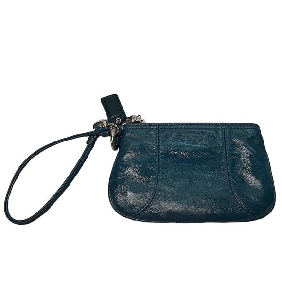 Coach Handbags - Coach Wristlet in Good Used Condition Turquoise / Teal Color